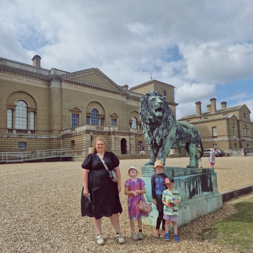 Family in front of Holkham Hall
